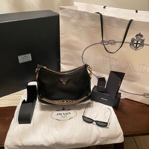 2023 leather Prada purse and sunglasses